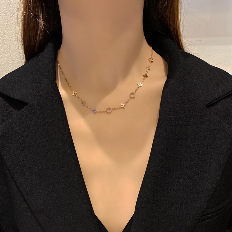 shop with crypto buy New simple temperament web celebrity light luxury titanium steel lucky grass necklace female collarbone chain pay with bitcoin
